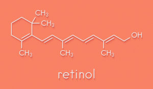 A pink background with the word retinol written in white.